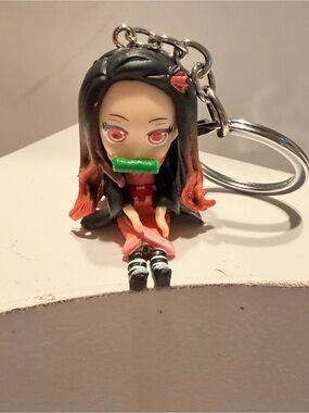 Cute Pink & Black Anime Doll Keychain with Green Accent
